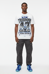 Male model wearing Triumph 47 Hustle Myth graphic tee with Nike Zoom Kobe 5 Protro X-Ray sneakers