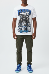 Male model wearing Hard Times Create Strong People graphic tee with Nike Zoom Kobe 5 Protro X-Ray sneakers