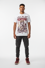 Male model wearing Silent Fortune Zadago graphic tee with Air Jordan 3 Bin23 sneakers, studio background