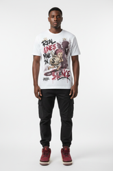 Mockup - Real Ones Move In Silence Graphic Tee worn by male model with Air Jordan 3 Bin23