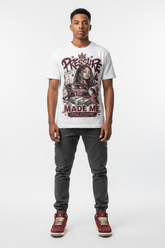 Male model wearing Pressure Made Me Zadago graphic tee with Air Jordan 3 Bin23 sneakers, studio background