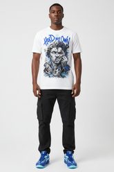 Male model wearing Hold My Own graphic tee with Nike Zoom Kobe 5 Protro X-Ray sneakers