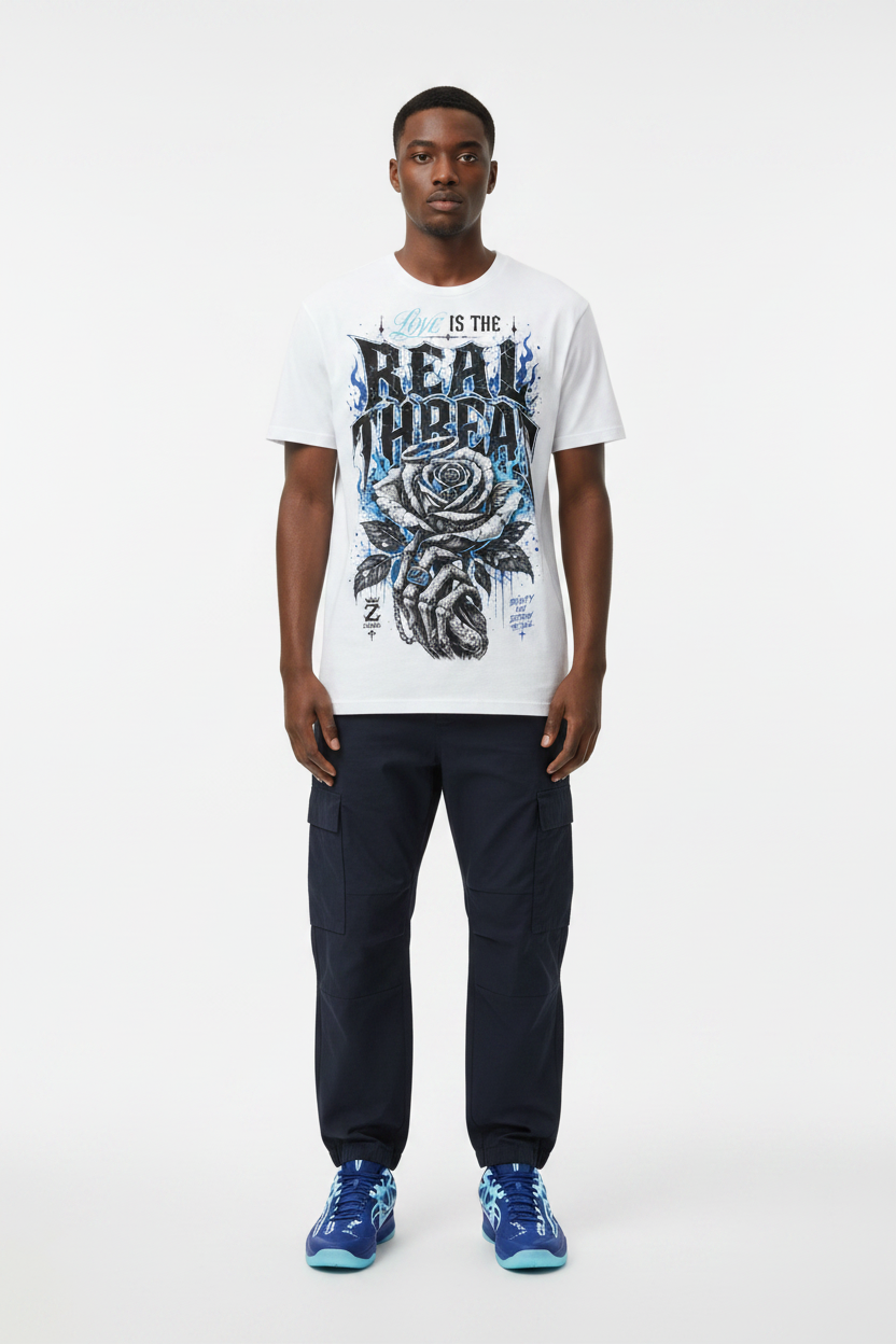 Male model wearing Love Is The Real Threat graphic tee with Nike Zoom Kobe 5 Protro X-Ray sneakers