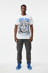 Male model wearing Real Ones Move In Silence graphic tee with Nike Zoom Kobe 5 Protro X-Ray sneakers