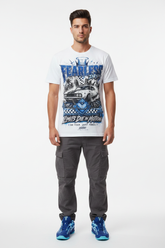 Male model wearing Fearless Drift graphic tee with Nike Zoom Kobe 5 Protro X-Ray sneakers