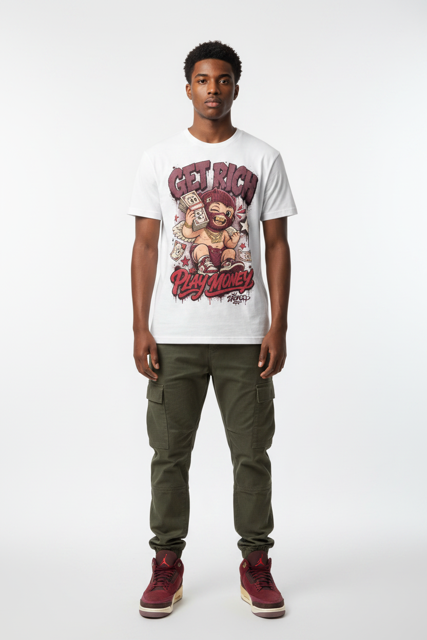 Male model wearing Get Rich Play Money Zadago graphic tee with Air Jordan 3 Bin23 sneakers, studio background