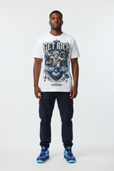 Male model wearing Get Rich Money Talk graphic tee with Nike Zoom Kobe 5 Protro X-Ray sneakers