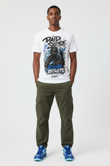 Male model wearing Paid In Silence graphic tee with Nike Zoom Kobe 5 Protro X-Ray sneakers