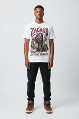 Male model wearing Go Fund Yourself Zadago graphic tee with Air Jordan 3 Bin23 sneakers, studio background