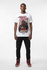 Male model wearing Paid In Silence Zadago graphic tee with Air Jordan 3 Bin23 sneakers, studio background