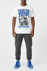 Male model wearing Take The Risk graphic tee with Nike Zoom Kobe 5 Protro X-Ray sneakers