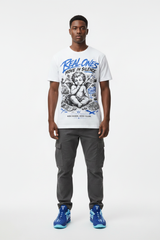 Male model wearing Real Ones Move In Silence graphic tee with Nike Zoom Kobe 5 Protro X-Ray sneakers